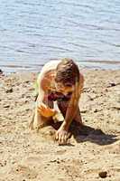 Girl playing with sand