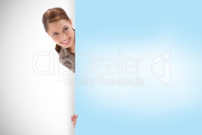 Composite image of attractive woman showing card