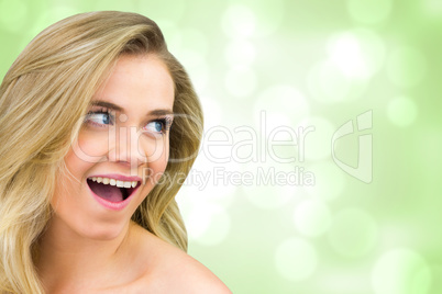 Composite image of smiling blonde natural beauty