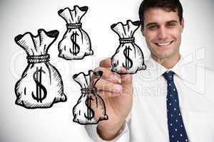 Composite image of businessman drawing money bags