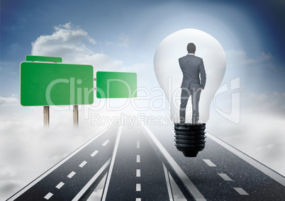 Composite image of thinking businessman in light bulb