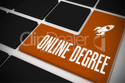 Online degree on black keyboard with orange key