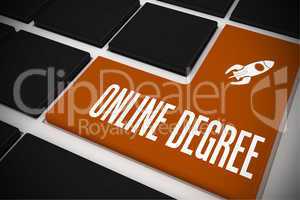 Online degree on black keyboard with orange key