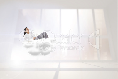 Composite image of relaxed businesswoman lying