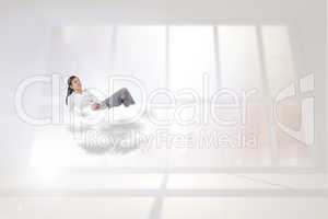 Composite image of relaxed businesswoman lying