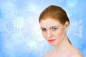 Composite image of beautiful redhead looking at camera