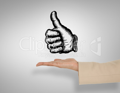 Composite image of female hand presenting thumbs up