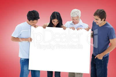 Composite image of casual group showing card