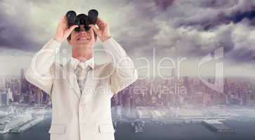 Composite image of confident businessman with binoculars