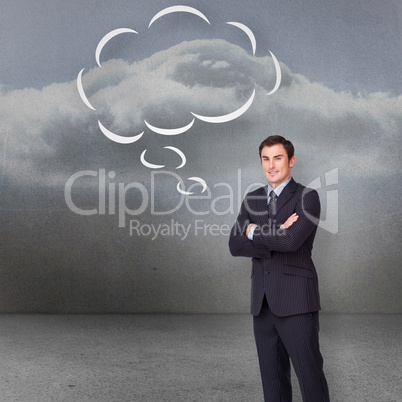 Composite image of young businessman standing cross-armed with s