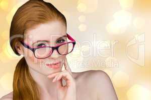 Composite image of beautiful redhead posing with glasses