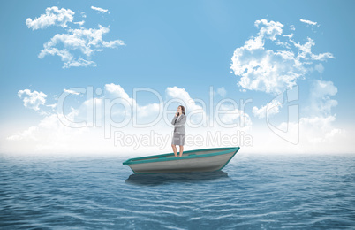 Composite image of smiling thoughtful businesswoman in a sailboa