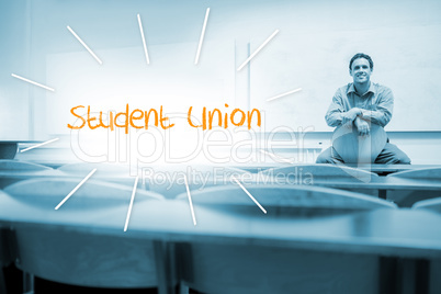 Student union against lecturer sitting in lecture hall