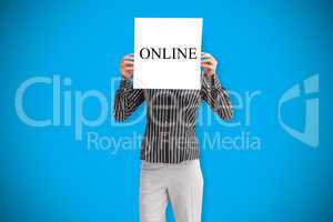 Businesswoman holding card saying online