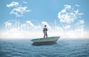 Composite image of thinking businessman in a sailboat