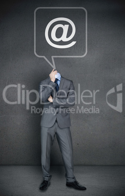 Headless businessman with at sign in speech bubble