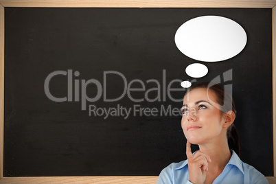 Composite image of thinking businesswoman looking upwards Composite image of thinking businesswoman looking upwards