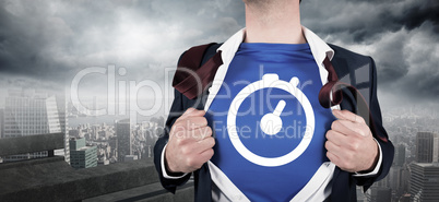 Composite image of businessman opening his shirt superhero style