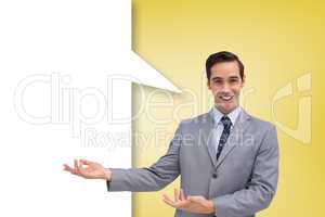 Composite image of young businessman presenting something with s