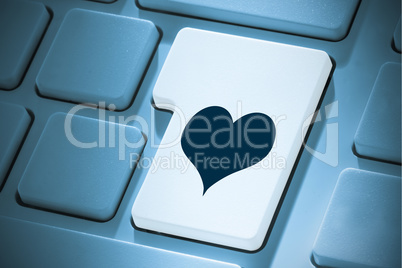 Composite image of heart on enter key