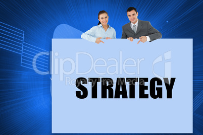 Business partners showing card saying strategy