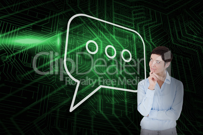 Composite image of speech bubble and thinking businesswoman