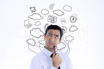 Composite image of thinking businessman holding glasses