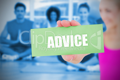 Fit blonde holding card saying advice