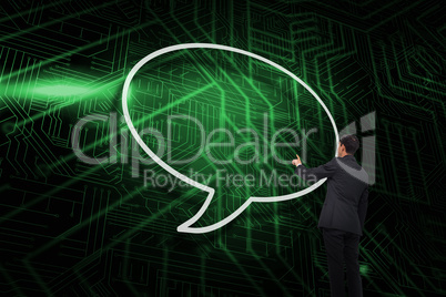 Composite image of speech bubble and businessman pointing