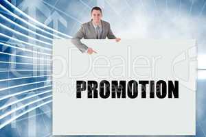 Businessman showing card saying promotion