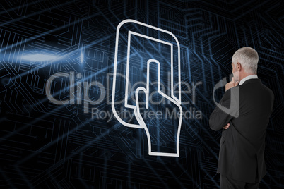 Composite image of tablet pc and businessman looking