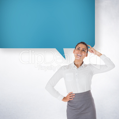 Smiling thoughtful businesswoman with speech bubble