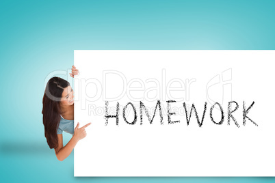 Pretty brunette showing card with homework