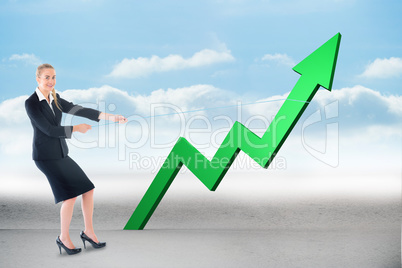 Composite image of businesswoman pulling a rope around arrow