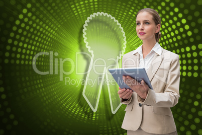 Composite image of merit badge and businesswoman using tablet