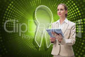 Composite image of merit badge and businesswoman using tablet