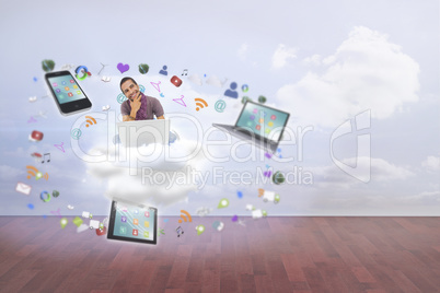 Composite image of thinking man sitting using laptop and smiling