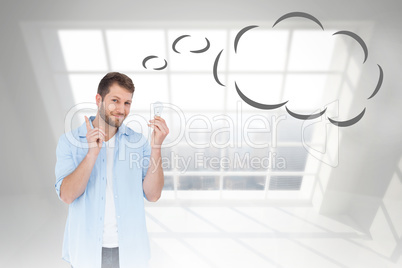Composite image of charming model holding a bulb in right hand w