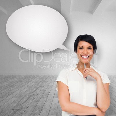 Composite image of thoughtful businesswoman with speech bubble