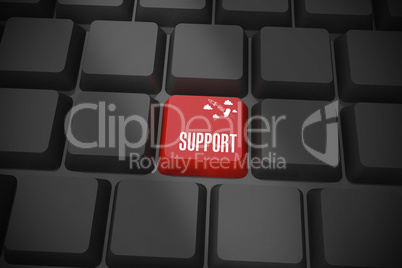 Support on black keyboard with red key
