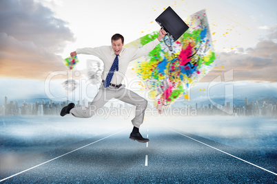 Composite image of cheerful jumping businessman with his suitcas