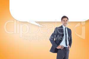 Composite image of smiling businessman with hands on hips with s