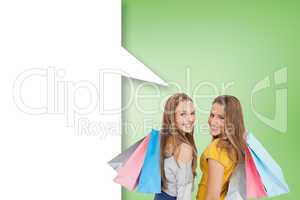 Composite image of two young women with shopping bags with speec