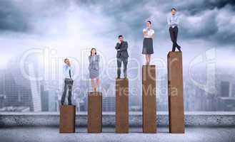 Composite image of business people standing
