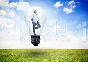 Composite image of thinking man in light bulb