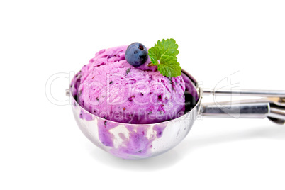 Ice cream blueberry in spoon with mint