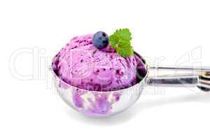 Ice cream blueberry in spoon with mint