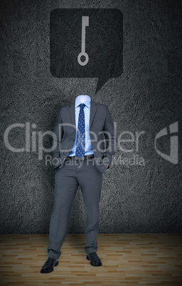 Headless businessman with key in speech bubble