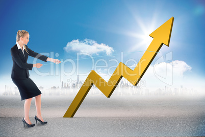 Composite image of businesswoman pulling a rope around arrow