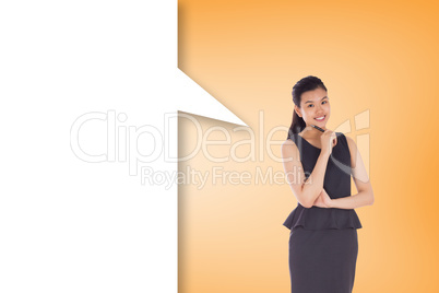 Composite image of thoughtful asian businesswoman with speech bu